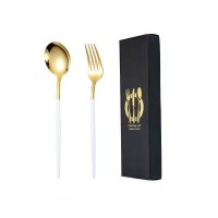 White and Gold Spoon and Fork Set